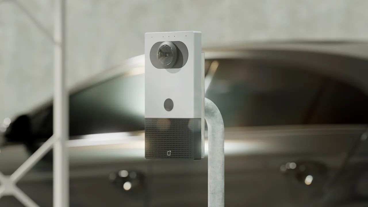 Verkada intercom device mounted on a pole in a parking garage setting.