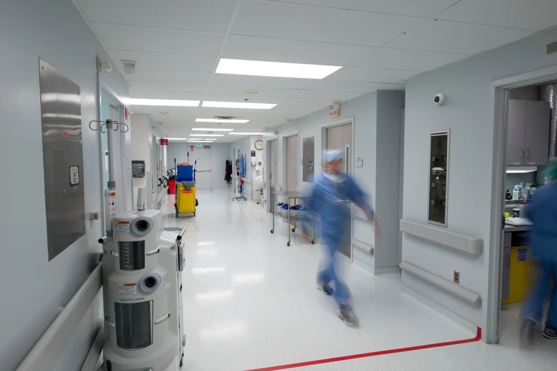 Hospital hallway protected by Monarch's cloud security platform — access control, cameras, and duress on one system