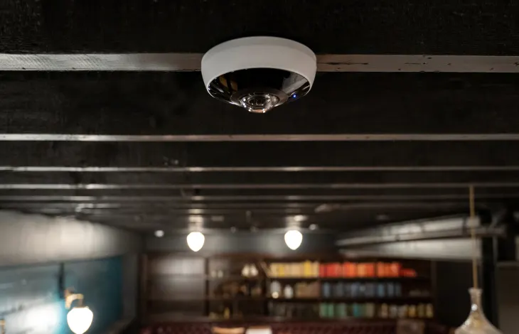 Verkada Fisheye Camera on building ceiling as part of 16 camera wireless security system 