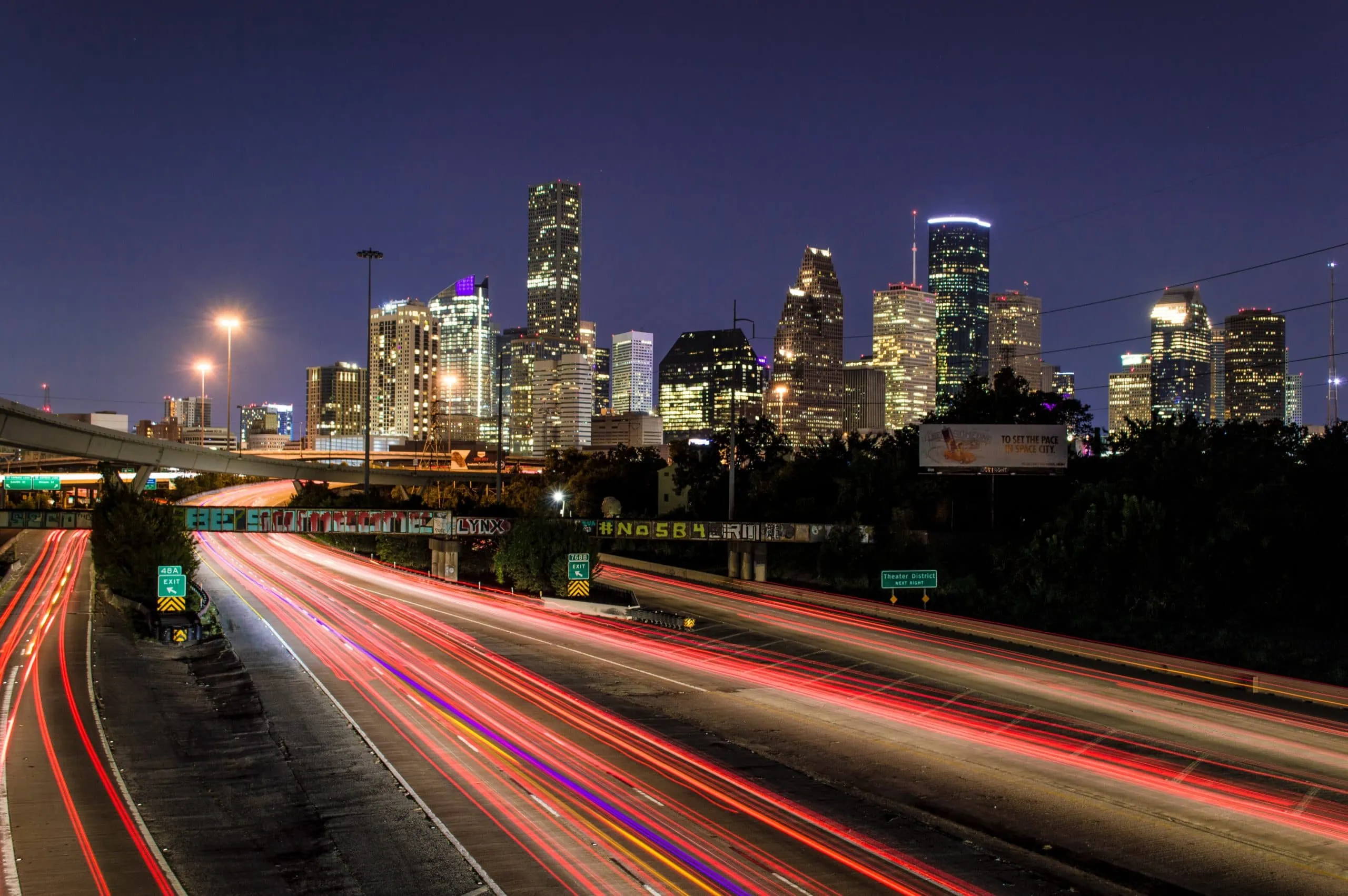 Skyline of Houston, TX with businesses protected by security cameras