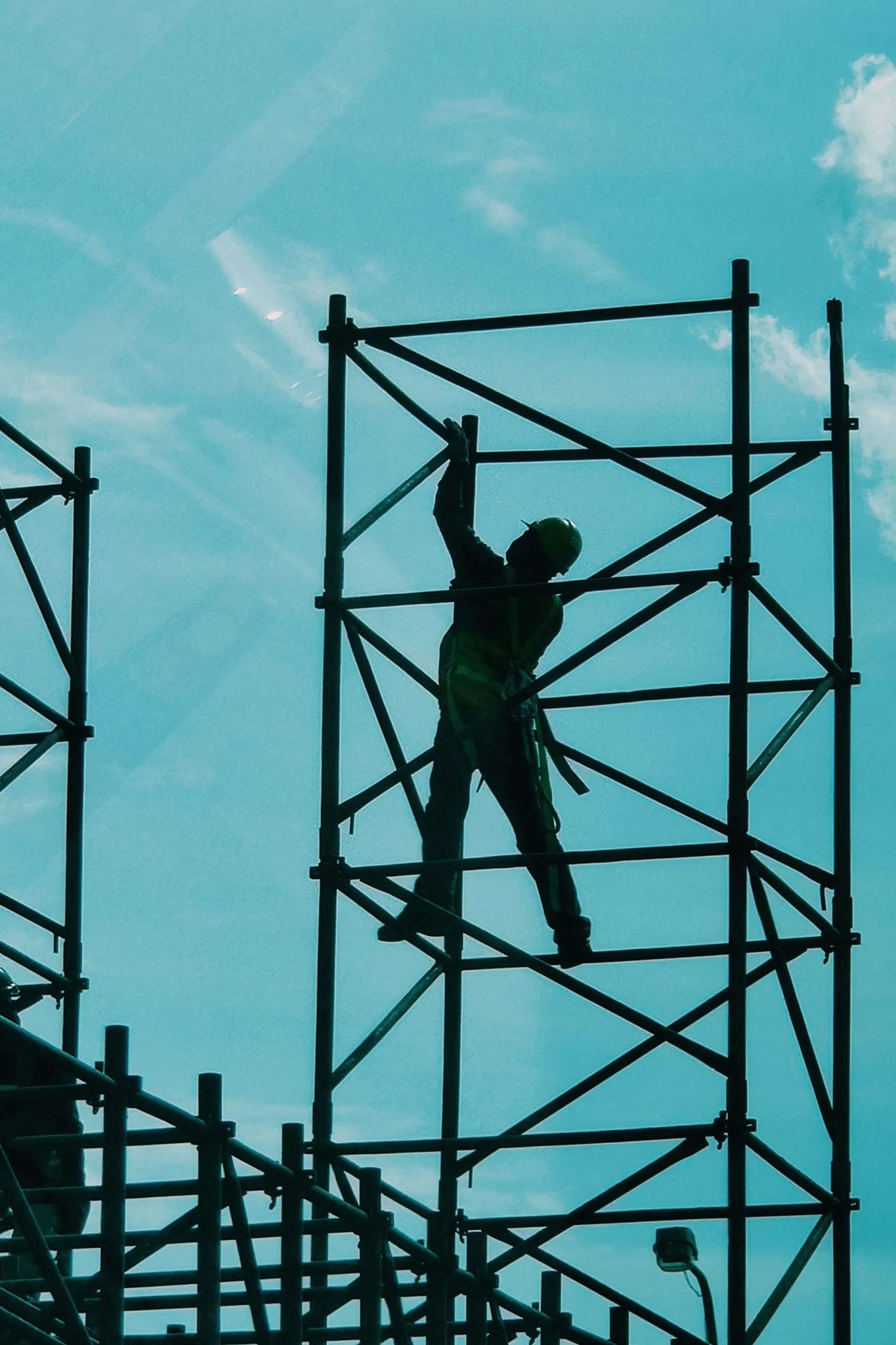 Worker on scaffolding captured by construction site surveillance