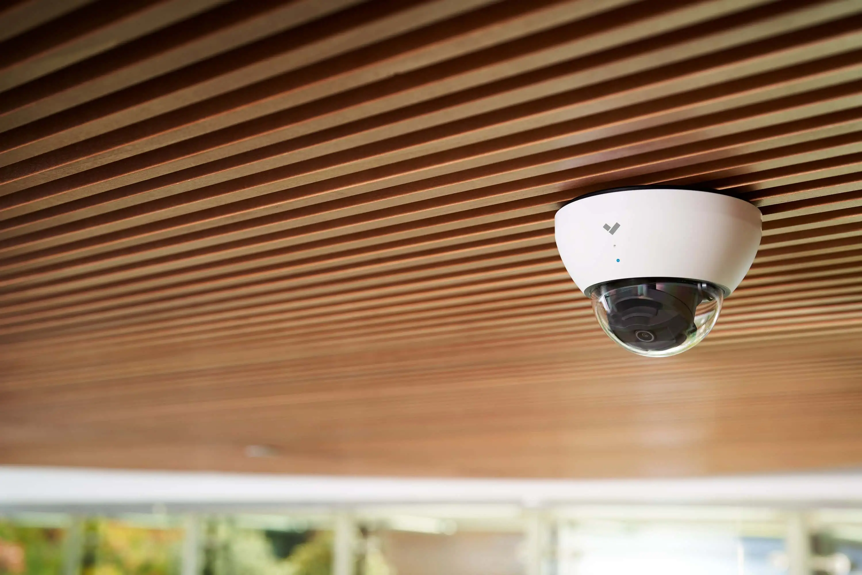 Verkada dome camera that records 24/7 mounted on the cieling