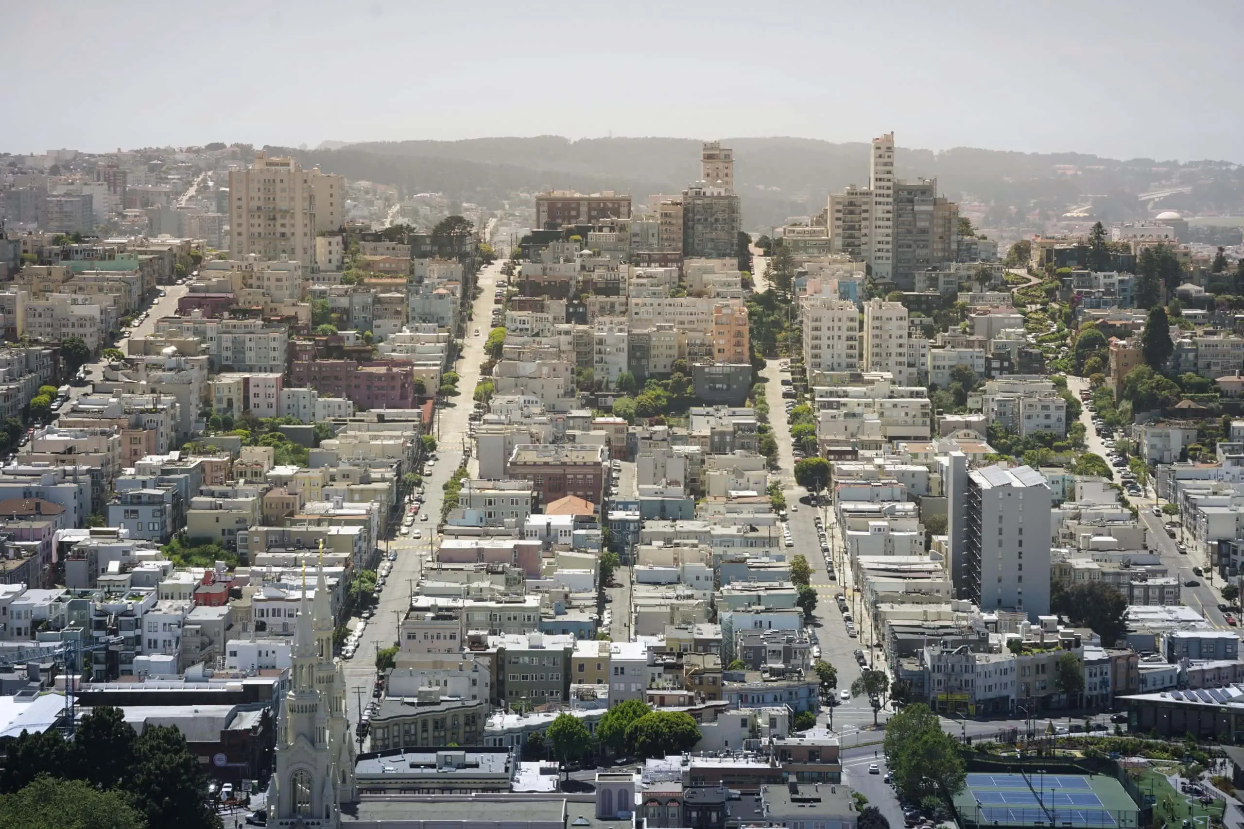 Aerial view of San Francisco with buildings that have security cameras