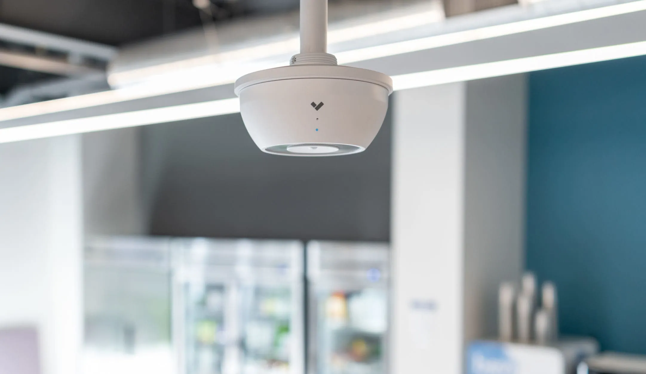 The Verkada SV11 Environmental Sensor mounted on a Tampa business’ ceiling