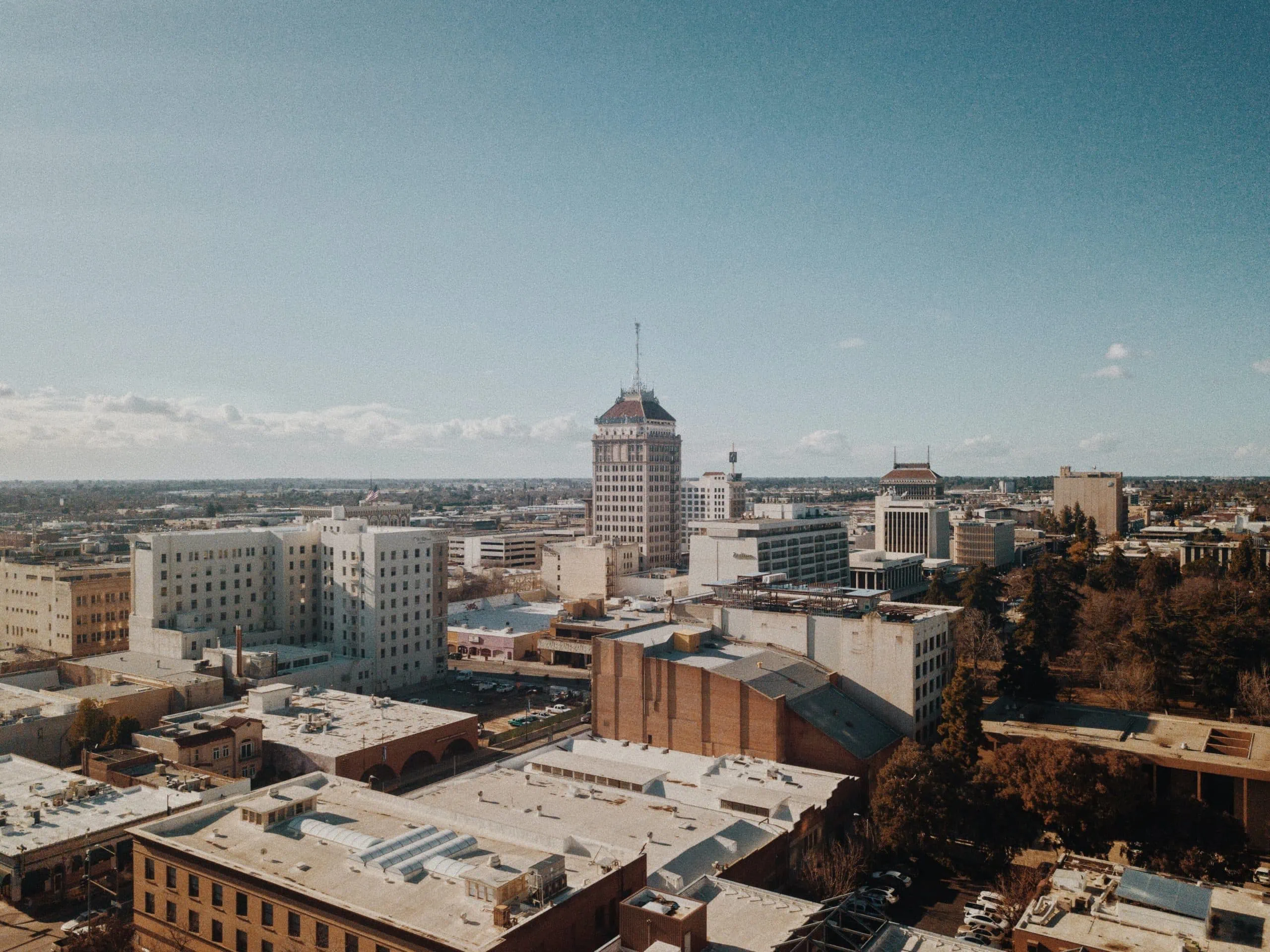 Skyline of Fresno, CA with enterprises that have security cameras
