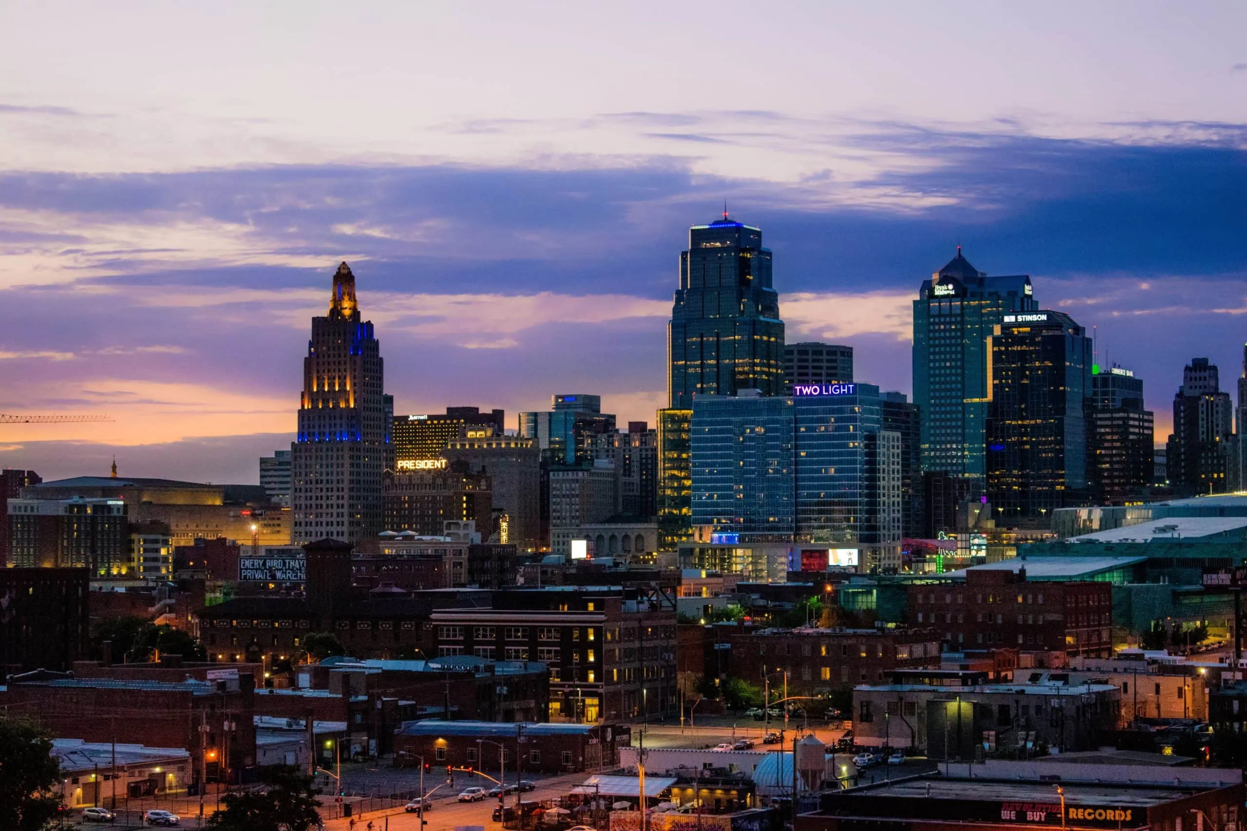 Panoramic of Downtown Kansas City skyline with businesses protected by security cameras