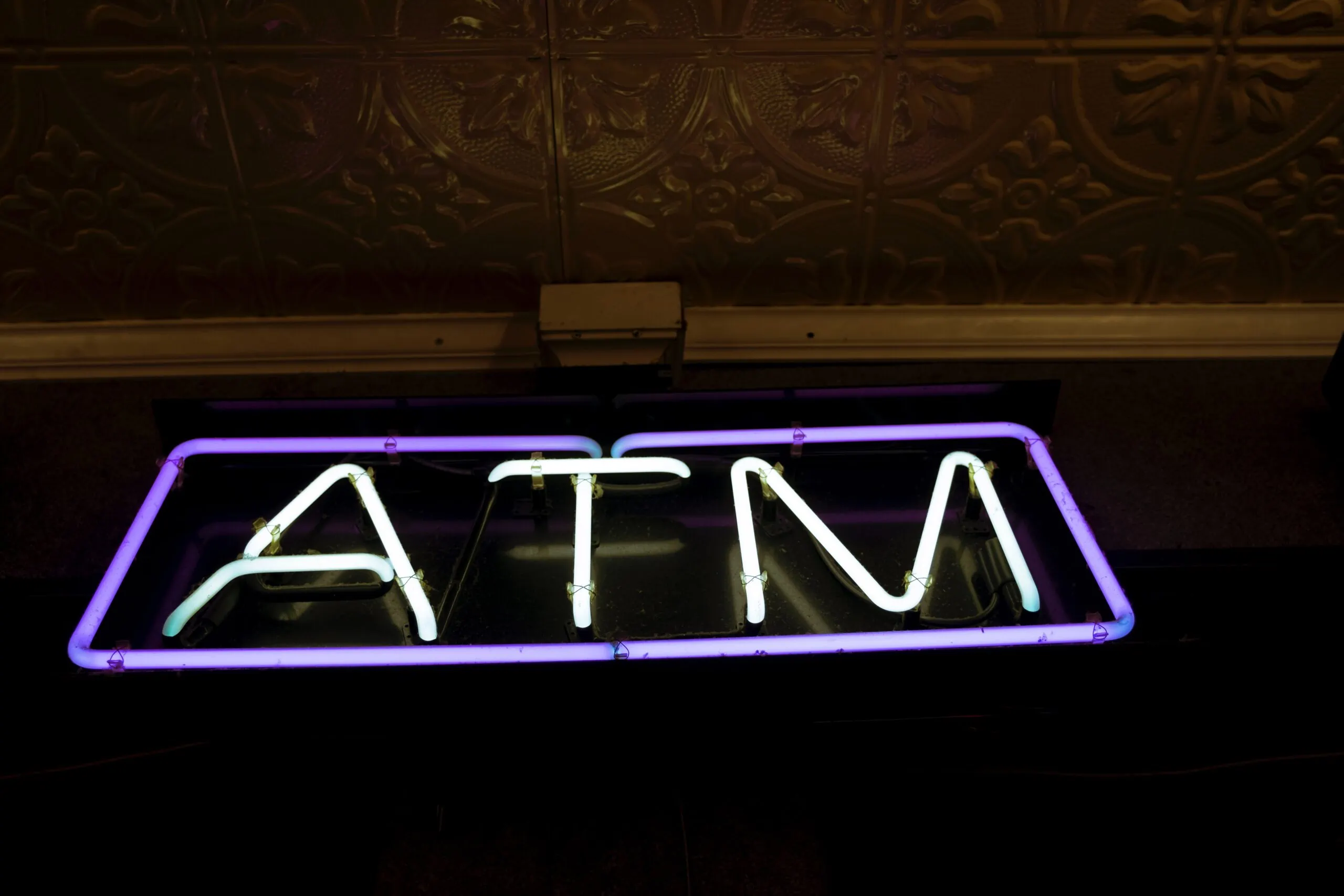 ATM sign in financial institution with bank security cameras
