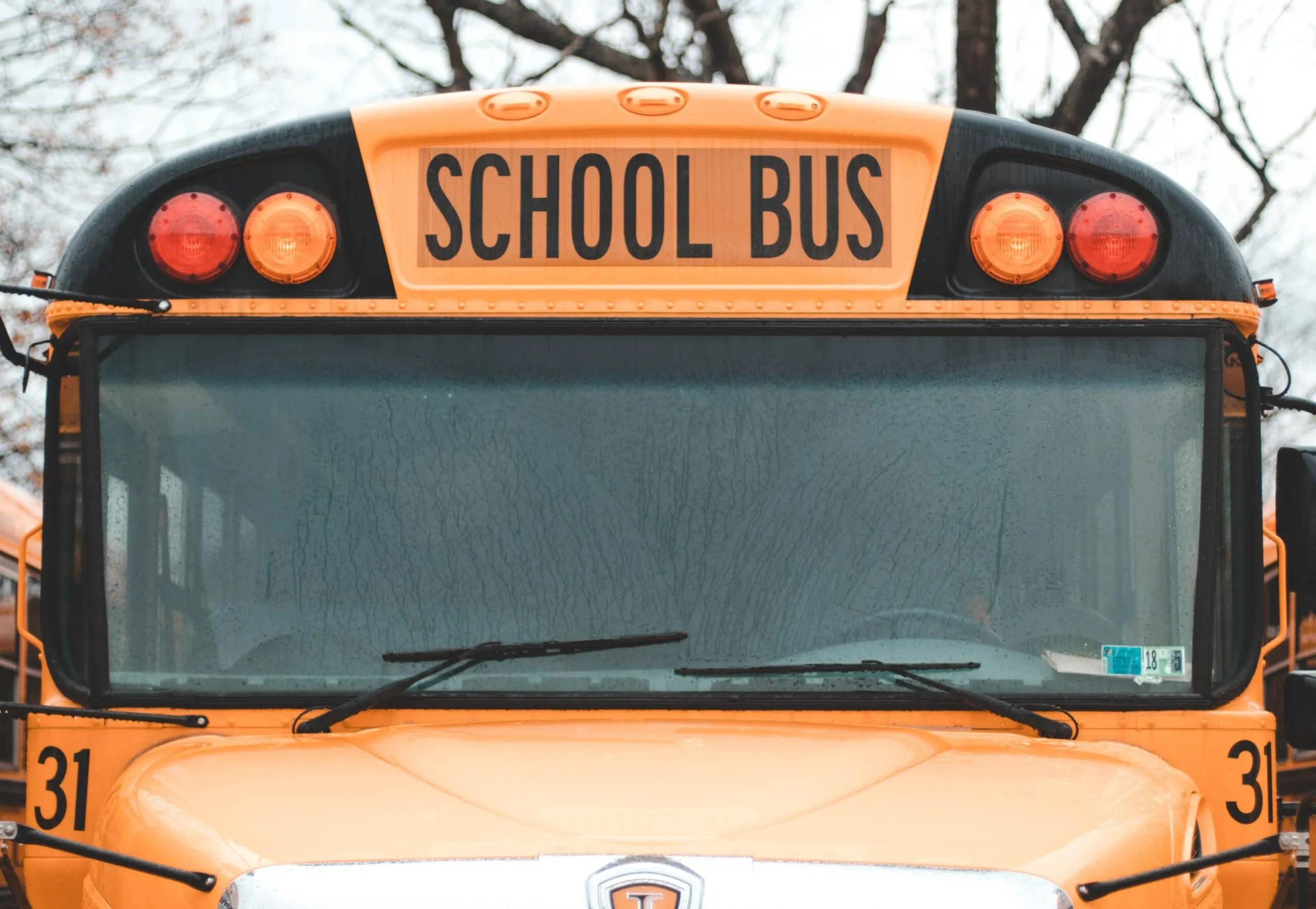Front view of school bus that has camera