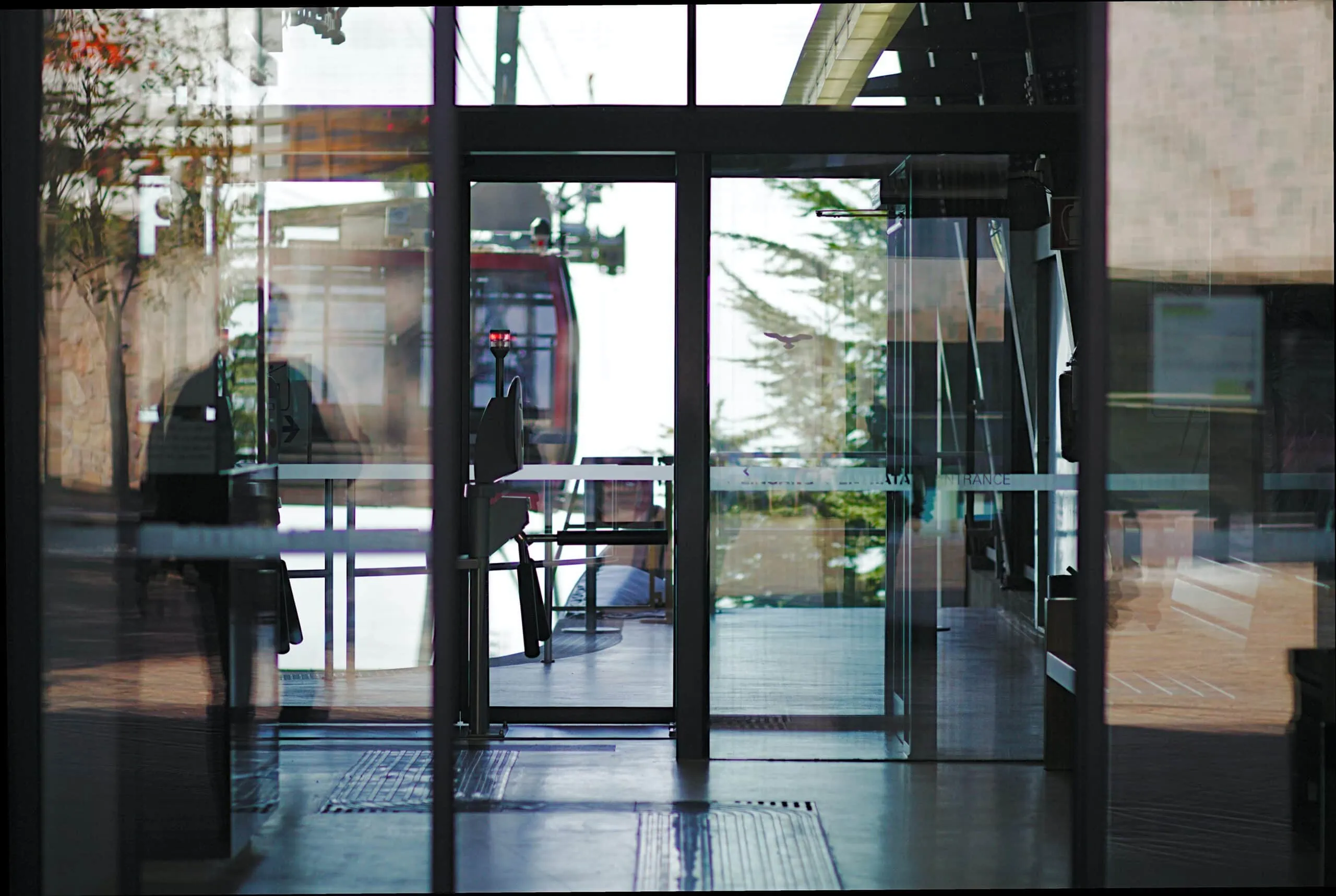 Bank glass door entrance secured with door access control system